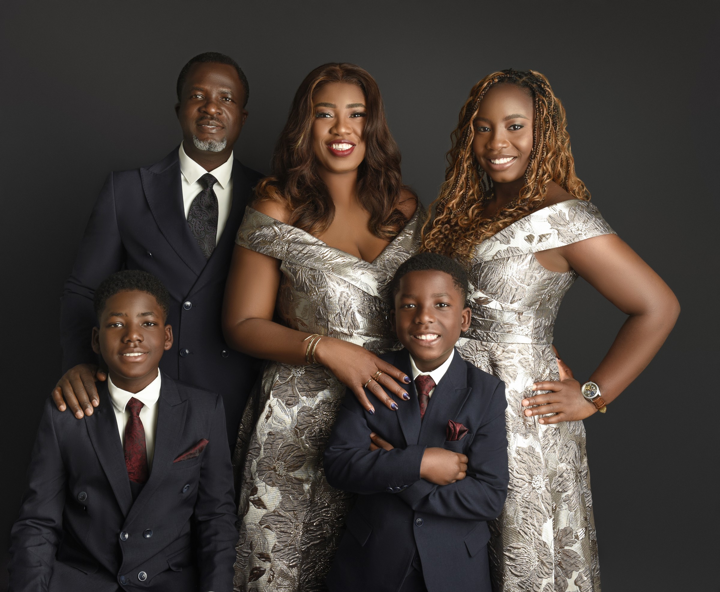 Family portrait in coordinated formal outfits